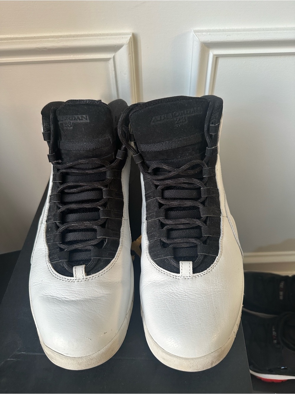 Jordan Black and White High-Top Sneakers with Red Liner